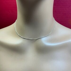SU Sterling Silver chain. 16 inches long